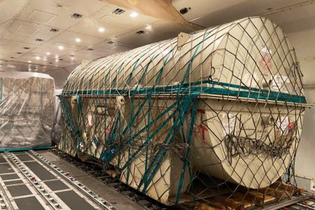 Gas turbine engine inside cargo aircraft
