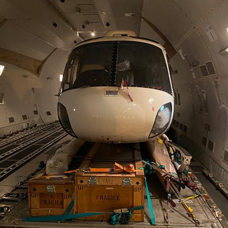 Helicopter cockpit component in cargo hold